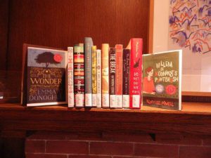 Canada Literary award winners 2016 sitting on fireplace