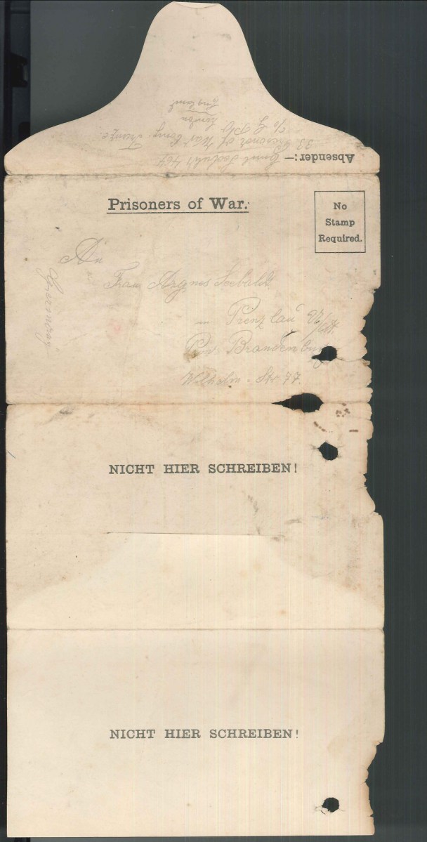 Image shows side 1 of letter; letter has caption Prisoners of War on top