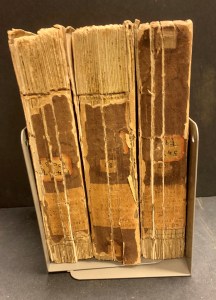 3 vols spines upright